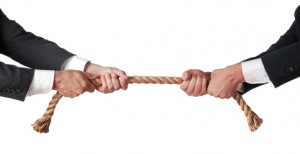 tug of war between businessmen